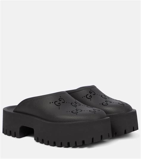 gucci clogs rubber dupe|Gucci black rubber sandals.